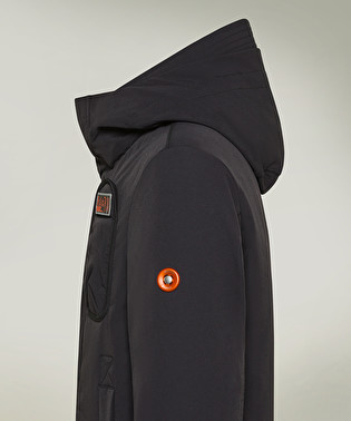 Technical parka in double material | Dekker